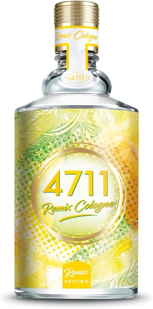 A clear glass bottle of Remix Cologne 4711 with a gold cap and a yellow and green patterned label, shown on a white background.